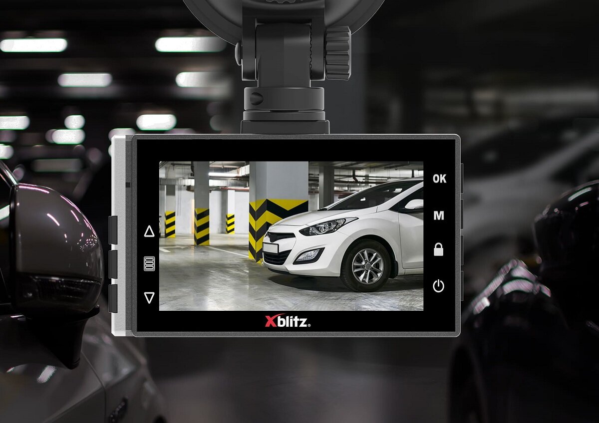 Wideorejestrator Xblitz S9 Duo 200mAh grafika przedstawia widok z kamery na parking podziemny